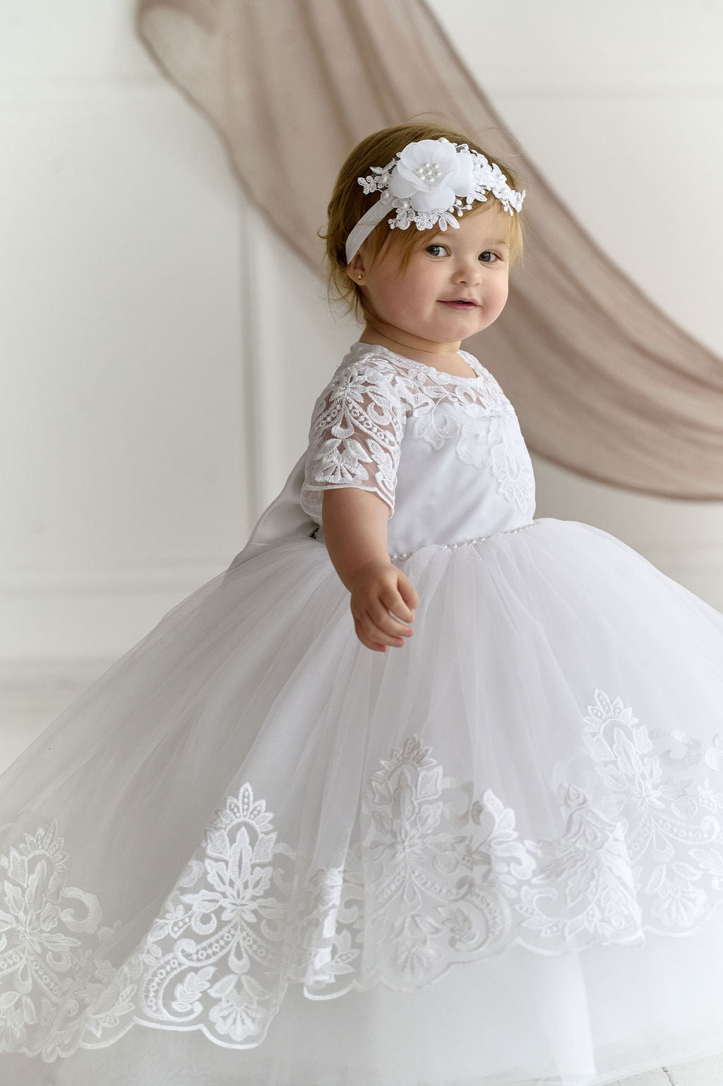 White Toddler Christening Dress with Train and Lace Hem — Puffy Baptism Gown with Bow Back