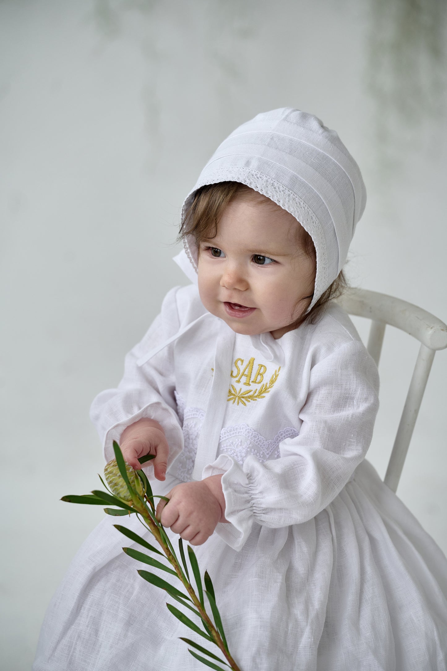 Linen christening bonnet.